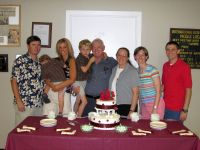 Judy & Gilbert with family at the surprise 40th anniversary party.